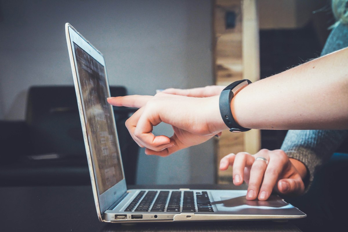 Person reviewing an accessibility checklist on a laptop screen